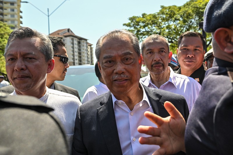 Badan anti-korupsi Malaysia menangkap mantan Perdana Menteri (PM) Muhyiddin Yassin pada hari Kamis, (9/3/2023). Ia dituding melakukan penyalahgunaan kekuasaan dan juga pencucian uang. (NurPhoto via Getty Images) Badan anti-korupsi Malaysia menangkap mantan Perdana Menteri (PM) Muhyiddin Yassin pada hari Kamis, (9/3/2023). Ia dituding melakukan penyalahgunaan kekuasaan dan juga pencucian uang. (NurPhoto via Getty Images)
