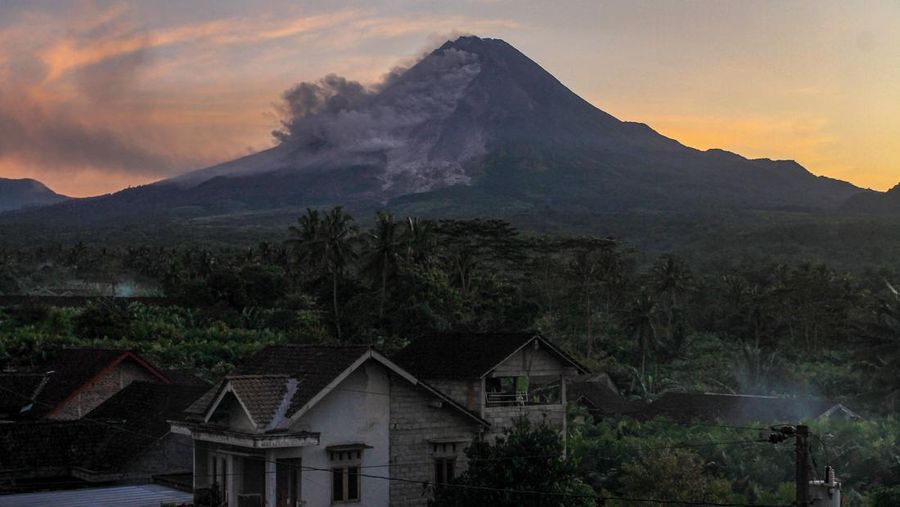 Lava spews out of Mount Merapi, Indonesia's most active volcano, as seen from the Kaliurang Selatan village in Srumbung, Magelang, Central Java on March 12, 2023. (Photo by DEVI RAHMAN / AFP) (Photo by DEVI RAHMAN/AFP via Getty Images)
