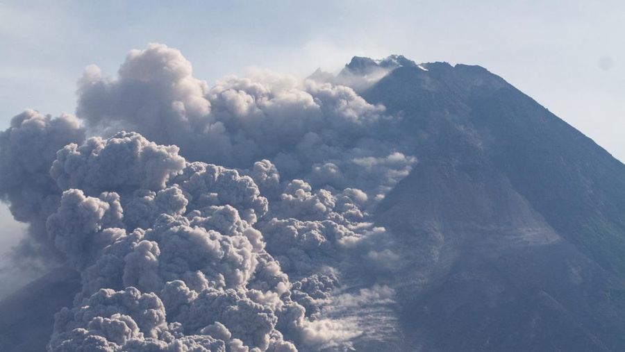 Lava spews out of Mount Merapi, Indonesia's most active volcano, as seen from the Kaliurang Selatan village in Srumbung, Magelang, Central Java on March 12, 2023. (Photo by DEVI RAHMAN / AFP) (Photo by DEVI RAHMAN/AFP via Getty Images)