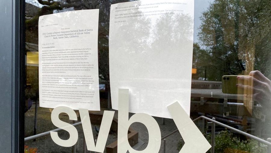 FILE PHOTO: A locked door to a Silicon Valley Bank (SVB) location on Sand Hill Road is seen in Menlo Park, California, U.S. March 10, 2023. REUTERS/Jeffrey Dastin/File Photo