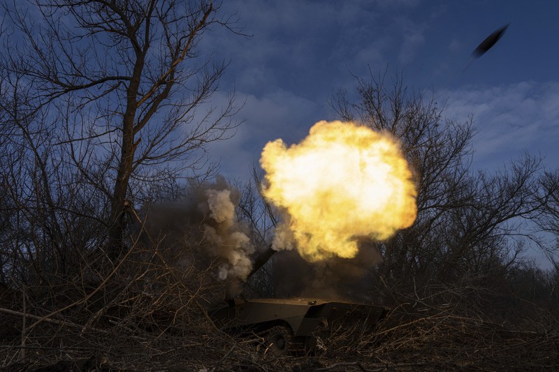 Ukraine Russia War Ukrainian self propelled howitzer 2s1 of 80 Air Assault brigade fires towards Russian forces at the frontline near Bakhmut, Ukraine, Friday, March 10, 2023. (AP Photo/Evgeniy Maloletka)
