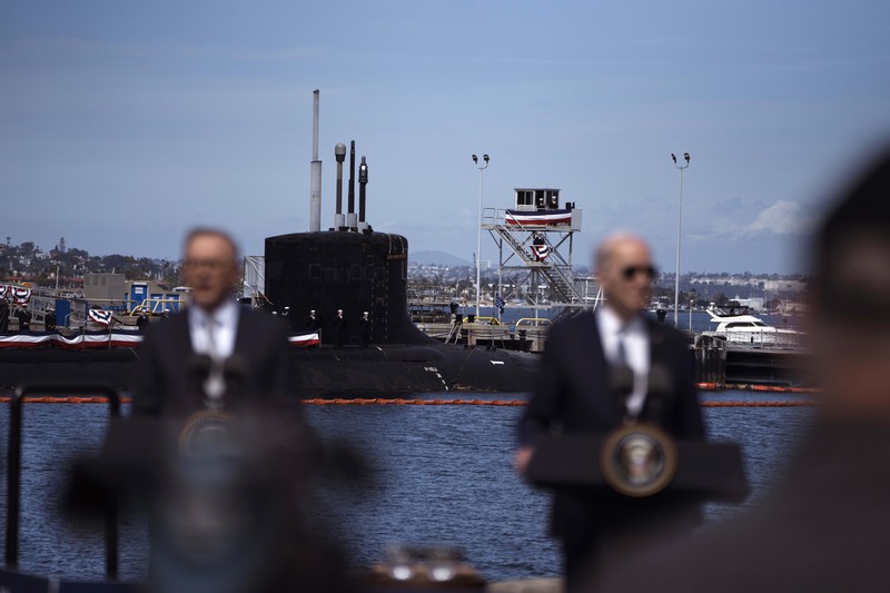 President Joe Biden arrives with Australian Prime Minister Anthony Albanese and British Prime Minister Rishi Sunak, right, for a news conference at Naval Base Point Loma, Monday, March 13, 2023, in San Diego. (AP Photo/Evan Vucci)