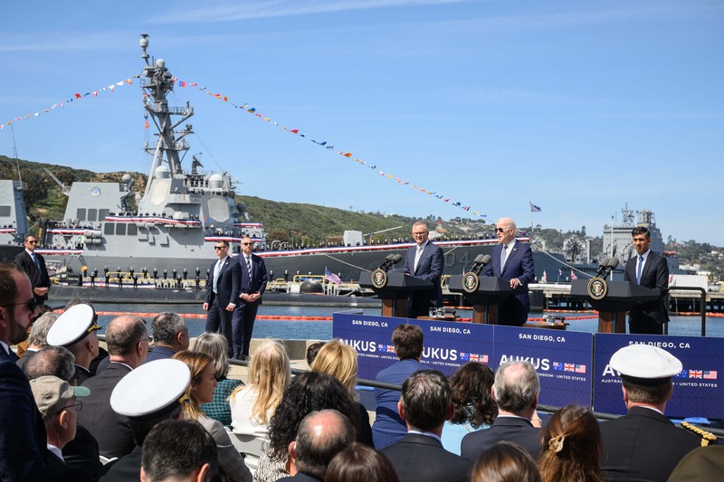 President Joe Biden arrives with Australian Prime Minister Anthony Albanese and British Prime Minister Rishi Sunak, right, for a news conference at Naval Base Point Loma, Monday, March 13, 2023, in San Diego. (AP Photo/Evan Vucci)