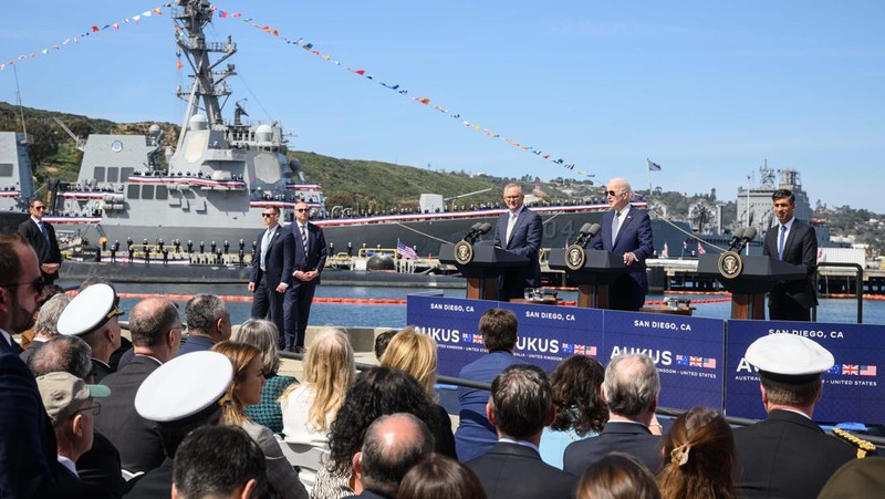President Joe Biden arrives with Australian Prime Minister Anthony Albanese and British Prime Minister Rishi Sunak, right, for a news conference at Naval Base Point Loma, Monday, March 13, 2023, in San Diego. (AP Photo/Evan Vucci)