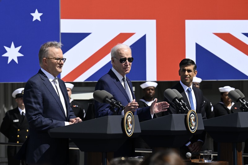 nyotk President Joe Biden arrives with Australian Prime Minister Anthony Albanese and British Prime Minister Rishi Sunak, right, for a news conference at Naval Base Point Loma, Monday, March 13, 2023, in San Diego. (AP Photo/Evan Vucci)