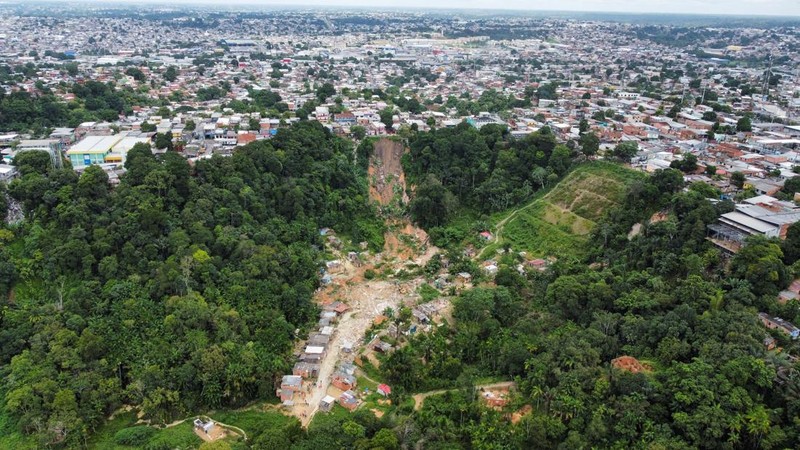 People work at the site of a deadly landslide caused by heavy rains in Manaus, Amazonas state, Brazil, March 13, 2023. REUTERS/Bruno Zanardo NO RESALES. NO ARCHIVES.