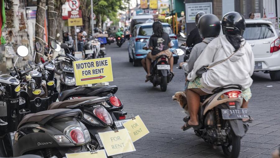 Rental motorcycles parked in Kuta, Bali, Indonesia, on Wednesday, March 15, 2023. Foreign tourists in Bali wont be allowed to use motorcycles to get around the island after a string of accidents led to injuries and even deaths. Photographer: Nyimas Laula/Bloomberg via Getty Images