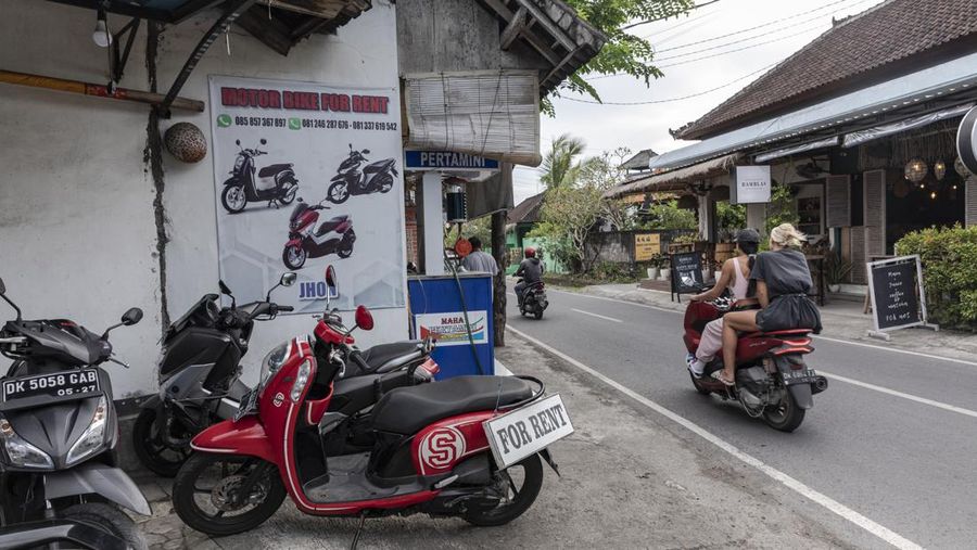 A sign for motorbike rental service in Canggu, Bali, Indonesia, on Thursday, March 16, 2023. Foreign tourists in Bali wont be allowed to use motorcycles to get around the island after a string of accidents led to injuries and even deaths. Photographer: Nyimas Laula/Bloomberg via Getty Images