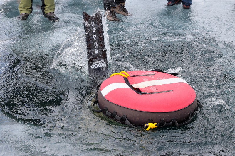 Czech freediver David Vencl dives to 52 metres under the ice of Lake Sils in one breath and wearing only a swimsuit in this picture taken from a video in Sils near St. Moritz, Switzerland March 14, 2023. David Vencl Organisation/Handout via REUTERS THIS IMAGE HAS BEEN SUPPLIED BY A THIRD PARTY. NO RESALES. NO ARCHIVES