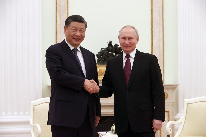 Russian President Vladimir Putin meets with China's President Xi Jinping at the Kremlin in Moscow on March 20, 2023. (Photo by Sergei KARPUKHIN / SPUTNIK / AFP)