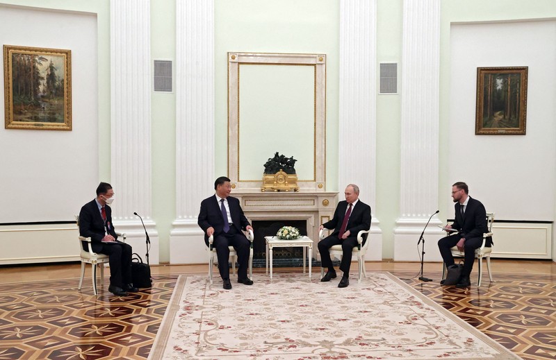Russian President Vladimir Putin meets with China's President Xi Jinping at the Kremlin in Moscow on March 20, 2023. (Photo by Sergei KARPUKHIN / SPUTNIK / AFP)