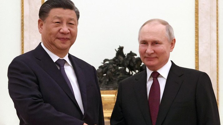 Presiden Rusia Vladimir Putin bertemu dengan Presiden China Xi Jinping di Kremlin di Moskow pada 20 Maret 2023. (SERGEI KARPUKHIN/SPUTNIK/AFP via Getty Images)