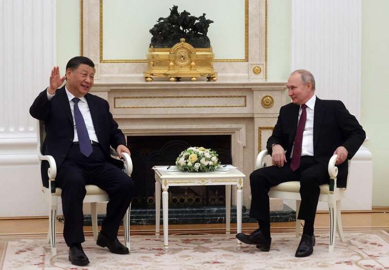 Russian President Vladimir Putin meets with China's President Xi Jinping at the Kremlin in Moscow on March 20, 2023. (Photo by Sergei KARPUKHIN / SPUTNIK / AFP)
