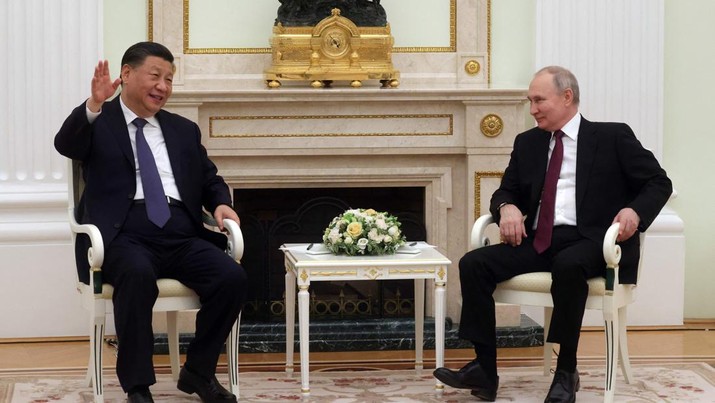 Presiden Rusia Vladimir Putin bertemu dengan Presiden China Xi Jinping di Kremlin di Moskow pada 20 Maret 2023. Presiden Rusia Vladimir Putin bertemu dengan Presiden China Xi Jinping di Kremlin di Moskow pada 20 Maret 2023. (SERGEI KARPUKHIN/SPUTNIK/AFP via Getty Images)