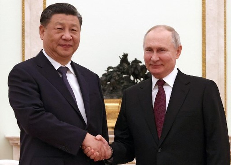 RUSSIA-CHINA-POLITICS-DIPLOMACY Russian President Vladimir Putin meets with China's President Xi Jinping at the Kremlin in Moscow on March 20, 2023. (Photo by Sergei KARPUKHIN / SPUTNIK / AFP)