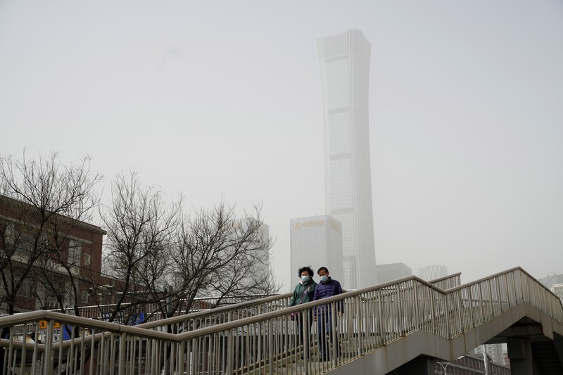 Badai pasir menyelimuti Beijing dan beberapa provinsi di China Utara. (AP/Ng Han Guan) Badai pasir menyelimuti Beijing dan beberapa provinsi di China Utara. (AP/Ng Han Guan)