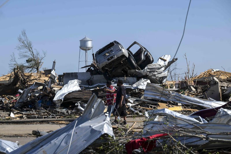 Amerika Serikat dilanda tornado dan badai petir yang dahsyat di wilayah Mississippi pada Jumat (24/3/2023) malam. Akibatnya, sekitar 23 orang tewas dan puluhan lainnya luka-luka usai peristiwa tersebut. (REUTERS/CHENEY ORR) Amerika Serikat dilanda tornado dan badai petir yang dahsyat di wilayah Mississippi pada Jumat (24/3/2023) malam. Akibatnya, sekitar 23 orang tewas dan puluhan lainnya luka-luka usai peristiwa tersebut. (REUTERS/CHENEY ORR)