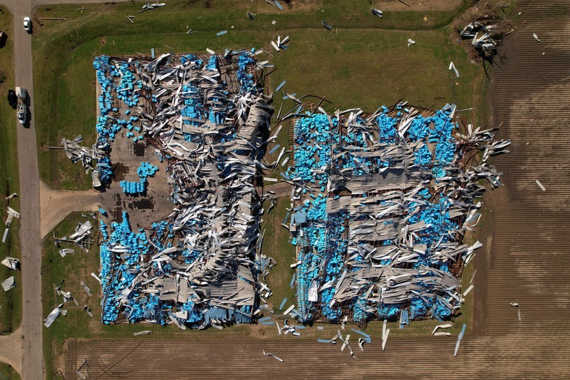 USA-WEATHER/MISSISSIPPI A vehicle is seen impaired by a piece of wood after thunderstorms spawning high straight-line winds and tornadoes ripped across the state, in Rolling Fork, Mississippi, U.S. March 26, 2023. REUTERS/Cheney Orr