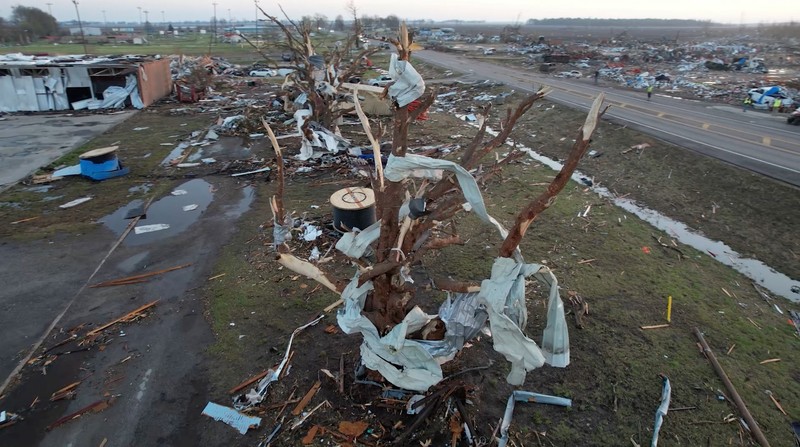 USA-WEATHER/MISSISSIPPI A vehicle is seen impaired by a piece of wood after thunderstorms spawning high straight-line winds and tornadoes ripped across the state, in Rolling Fork, Mississippi, U.S. March 26, 2023. REUTERS/Cheney Orr
