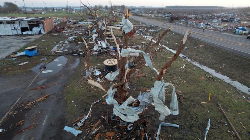 A vehicle is seen impaired by a piece of wood after thunderstorms spawning high straight-line winds and tornadoes ripped across the state, in Rolling Fork, Mississippi, U.S. March 26, 2023.  REUTERS/Cheney Orr