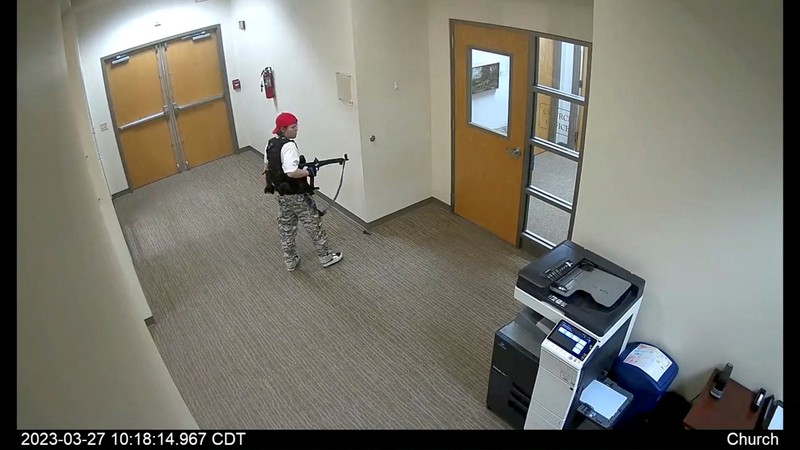 TENNESSEE-SHOOTING/ A still image from surveillance video shows what the Metropolitan Nashville Police Department describe as mass shooting suspect Audrey Elizabeth Hale, 28, arriving by car at The Covenant School carrying weapons in Nashville, Tennessee, U.S. March 27, 2023. Metropolitan Nashville Police Department/Handout via REUTERS THIS IMAGE HAS BEEN SUPPLIED BY A THIRD PARTY. NO RESALES. NO ARCHIVES