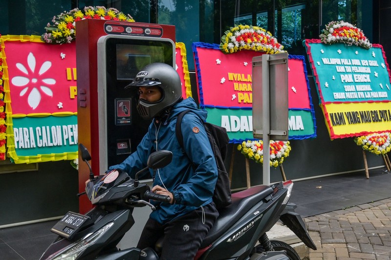This picture shows wreaths expressing the concern of football fans outside the office of the Indonesian football association in Jakarta on March 30, 2023. - FIFA announced on March 29 it had removed Indonesia as hosts of this year's under-20 World Cup amid political turmoil over Israel's participation. (Photo by BAY ISMOYO / AFP) (Photo by BAY ISMOYO/AFP via Getty Images)