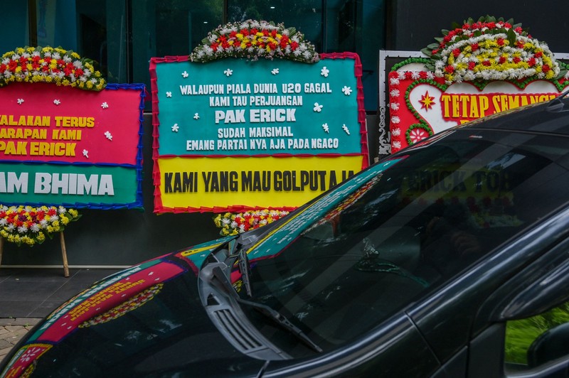 This picture shows wreaths expressing the concern of football fans outside the office of the Indonesian football association in Jakarta on March 30, 2023. - FIFA announced on March 29 it had removed Indonesia as hosts of this year's under-20 World Cup amid political turmoil over Israel's participation. (Photo by BAY ISMOYO / AFP) (Photo by BAY ISMOYO/AFP via Getty Images)