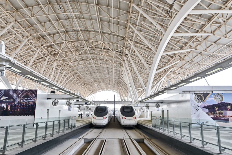 This picture taken on December 12, 2019 shows a view of a Haramain High Speed train, part of a network linking Saudi Arabia's two Muslim holy cities of Mecca and Medina, while at the airport station in the Red Sea city of Jeddah. - The high-speed railway, inaugurated by King Salman in September 2018, runs 450 kilometres (280 miles) via the Red Sea port of Jeddah, shuttling passengers at speeds of up to 300 kilometres per hour. Officials had described it as the biggest transport project in the region. Saudi is boosting its infrastructure spending and expanding its railways as it seeks to diversify its oil-dependent economy. (Photo by GIUSEPPE CACACE / AFP) (Photo by GIUSEPPE CACACE/AFP via Getty Images)
