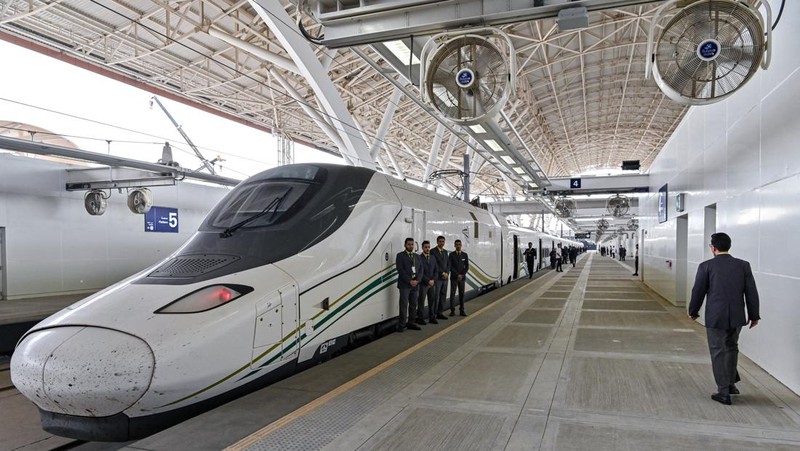 This picture taken on December 12, 2019 shows a view of a Haramain High Speed train, part of a network linking Saudi Arabia's two Muslim holy cities of Mecca and Medina, while at the airport station in the Red Sea city of Jeddah. - The high-speed railway, inaugurated by King Salman in September 2018, runs 450 kilometres (280 miles) via the Red Sea port of Jeddah, shuttling passengers at speeds of up to 300 kilometres per hour. Officials had described it as the biggest transport project in the region. Saudi is boosting its infrastructure spending and expanding its railways as it seeks to diversify its oil-dependent economy. (Photo by GIUSEPPE CACACE / AFP) (Photo by GIUSEPPE CACACE/AFP via Getty Images)