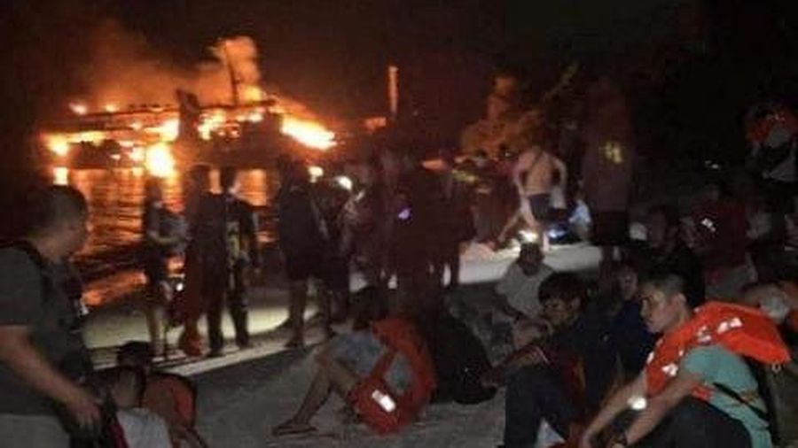 Philippine Coast Guard respond to the fire incident onboard M/V LADY MARY JOY 3 at the waters off Baluk-Baluk Island, Hadji Muhtamad, Basilan, Philippines, March 29, 2023. Philippine Coast Guard/Handout via REUTERS    THIS IMAGE HAS BEEN SUPPLIED BY A THIRD PARTY. NO RESALES. NO ARCHIVES.