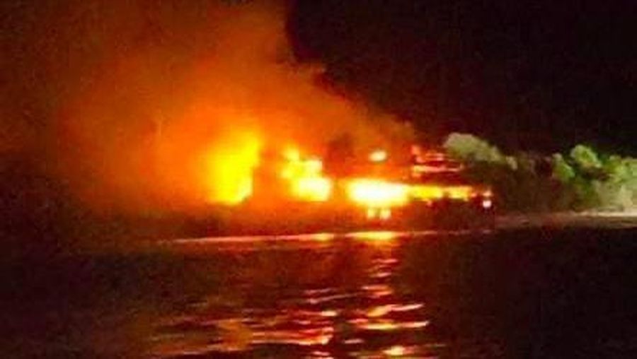 Philippine Coast Guard respond to the fire incident onboard M/V LADY MARY JOY 3 at the waters off Baluk-Baluk Island, Hadji Muhtamad, Basilan, Philippines, March 29, 2023. Philippine Coast Guard/Handout via REUTERS    THIS IMAGE HAS BEEN SUPPLIED BY A THIRD PARTY. NO RESALES. NO ARCHIVES.