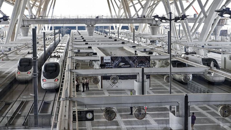 This picture taken on December 12, 2019 shows a view of a Haramain High Speed train, part of a network linking Saudi Arabia's two Muslim holy cities of Mecca and Medina, while at the airport station in the Red Sea city of Jeddah. - The high-speed railway, inaugurated by King Salman in September 2018, runs 450 kilometres (280 miles) via the Red Sea port of Jeddah, shuttling passengers at speeds of up to 300 kilometres per hour. Officials had described it as the biggest transport project in the region. Saudi is boosting its infrastructure spending and expanding its railways as it seeks to diversify its oil-dependent economy. (Photo by GIUSEPPE CACACE / AFP) (Photo by GIUSEPPE CACACE/AFP via Getty Images)