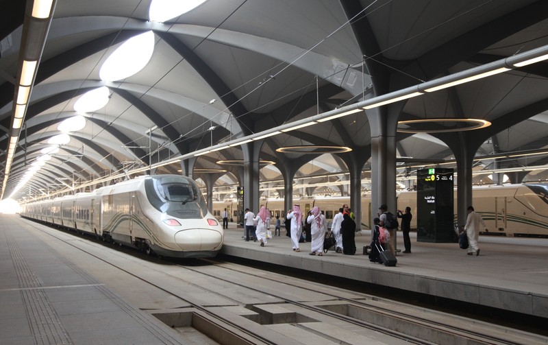 This picture taken on December 12, 2019 shows a view of a Haramain High Speed train, part of a network linking Saudi Arabia's two Muslim holy cities of Mecca and Medina, while at the airport station in the Red Sea city of Jeddah. - The high-speed railway, inaugurated by King Salman in September 2018, runs 450 kilometres (280 miles) via the Red Sea port of Jeddah, shuttling passengers at speeds of up to 300 kilometres per hour. Officials had described it as the biggest transport project in the region. Saudi is boosting its infrastructure spending and expanding its railways as it seeks to diversify its oil-dependent economy. (Photo by GIUSEPPE CACACE / AFP) (Photo by GIUSEPPE CACACE/AFP via Getty Images)