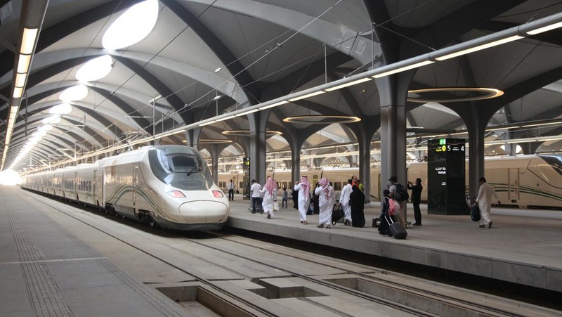 This picture taken on December 12, 2019 shows a view of a Haramain High Speed train, part of a network linking Saudi Arabia's two Muslim holy cities of Mecca and Medina, while at the airport station in the Red Sea city of Jeddah. - The high-speed railway, inaugurated by King Salman in September 2018, runs 450 kilometres (280 miles) via the Red Sea port of Jeddah, shuttling passengers at speeds of up to 300 kilometres per hour. Officials had described it as the biggest transport project in the region. Saudi is boosting its infrastructure spending and expanding its railways as it seeks to diversify its oil-dependent economy. (Photo by GIUSEPPE CACACE / AFP) (Photo by GIUSEPPE CACACE/AFP via Getty Images)
