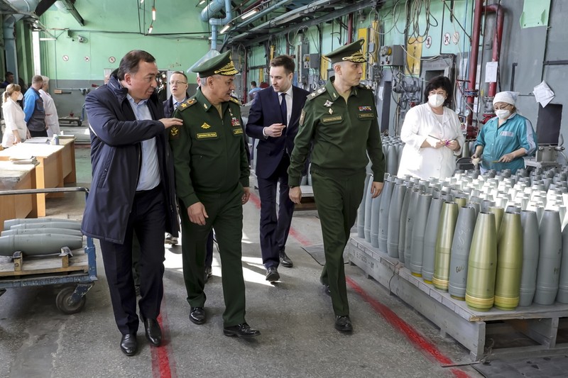 Russia Military This photo made from video provided by the Russian Defense Ministry Press Service on Wednesday, March 29, 2023, shows Russian Defense Minister Sergei Shoigu, center, visiting defense factories in the Chelyabinsk and Kirov regions producing artillery rounds and rockets. Russian Defense Ministry said that the factories' managers reported on their efforts to modernize industrial assets to boost production. (Russian Defense Ministry Press Service via AP)