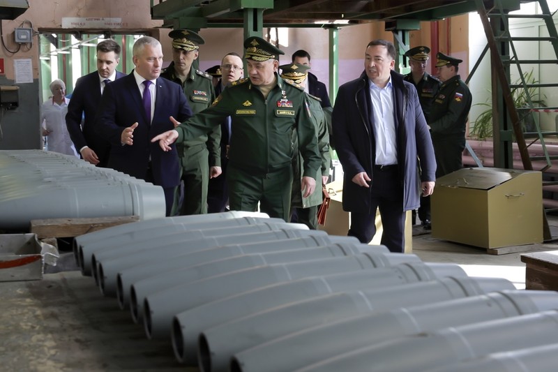Russia Military This photo made from video provided by the Russian Defense Ministry Press Service on Wednesday, March 29, 2023, shows Russian Defense Minister Sergei Shoigu, center, visiting defense factories in the Chelyabinsk and Kirov regions producing artillery rounds and rockets. Russian Defense Ministry said that the factories' managers reported on their efforts to modernize industrial assets to boost production. (Russian Defense Ministry Press Service via AP)