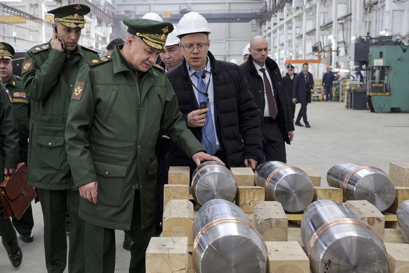 Russia Military This photo made from video provided by the Russian Defense Ministry Press Service on Wednesday, March 29, 2023, shows Russian Defense Minister Sergei Shoigu, center, visiting defense factories in the Chelyabinsk and Kirov regions producing artillery rounds and rockets. Russian Defense Ministry said that the factories' managers reported on their efforts to modernize industrial assets to boost production. (Russian Defense Ministry Press Service via AP)