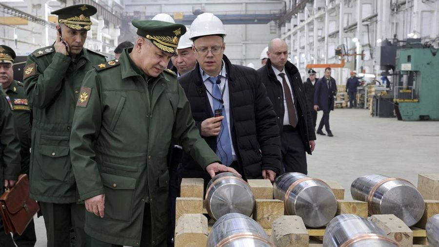 This photo made from video provided by the Russian Defense Ministry Press Service on Wednesday, March 29, 2023, shows Russian Defense Minister Sergei Shoigu, center, visiting defense factories in the Chelyabinsk and Kirov regions producing artillery rounds and rockets. Russian Defense Ministry said that the factories' managers reported on their efforts to modernize industrial assets to boost production. (Russian Defense Ministry Press Service via AP)