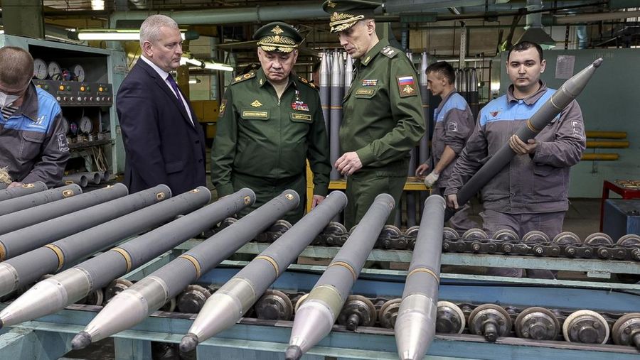 This photo made from video provided by the Russian Defense Ministry Press Service on Wednesday, March 29, 2023, shows Russian Defense Minister Sergei Shoigu, center, visiting defense factories in the Chelyabinsk and Kirov regions producing artillery rounds and rockets. Russian Defense Ministry said that the factories' managers reported on their efforts to modernize industrial assets to boost production. (Russian Defense Ministry Press Service via AP)