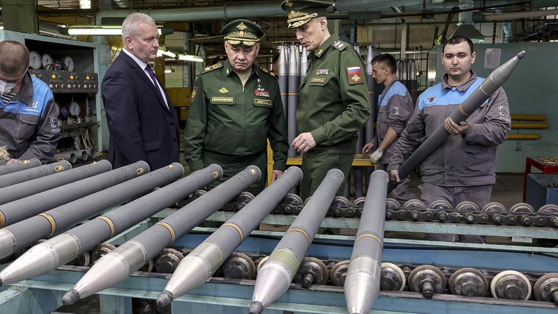 This photo made from video provided by the Russian Defense Ministry Press Service on Wednesday, March 29, 2023, shows Russian Defense Minister Sergei Shoigu, center, visiting defense factories in the Chelyabinsk and Kirov regions producing artillery rounds and rockets. Russian Defense Ministry said that the factories' managers reported on their efforts to modernize industrial assets to boost production. (Russian Defense Ministry Press Service via AP)