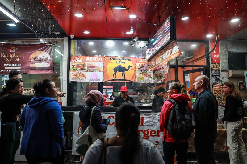 1478798956 SYDNEY, AUSTRALIA - APRIL 01: People attend the Ramadan Nights food and cultural festival at Lakemba on April 01, 2023 in Sydney, Australia. The holy fasting month of Ramadan is observed by Muslims around the world, including many in Australia, who adhere to its principles in their own suburban communities. (Photo by Roni Bintang/Getty Images)