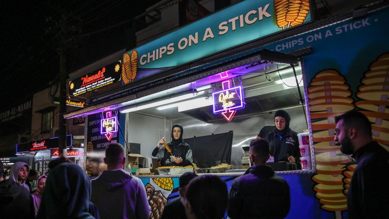 SYDNEY, AUSTRALIA - APRIL 01: People attend the Ramadan Nights food and cultural festival at Lakemba on April 01, 2023 in Sydney, Australia. The holy fasting month of Ramadan is observed by Muslims around the world, including many in Australia, who adhere to its principles in their own suburban communities. (Photo by Roni Bintang/Getty Images)