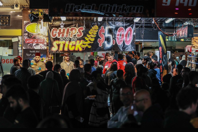 SYDNEY, AUSTRALIA - APRIL 01: People attend the Ramadan Nights food and cultural festival at Lakemba on April 01, 2023 in Sydney, Australia. The holy fasting month of Ramadan is observed by Muslims around the world, including many in Australia, who adhere to its principles in their own suburban communities. (Photo by Roni Bintang/Getty Images)