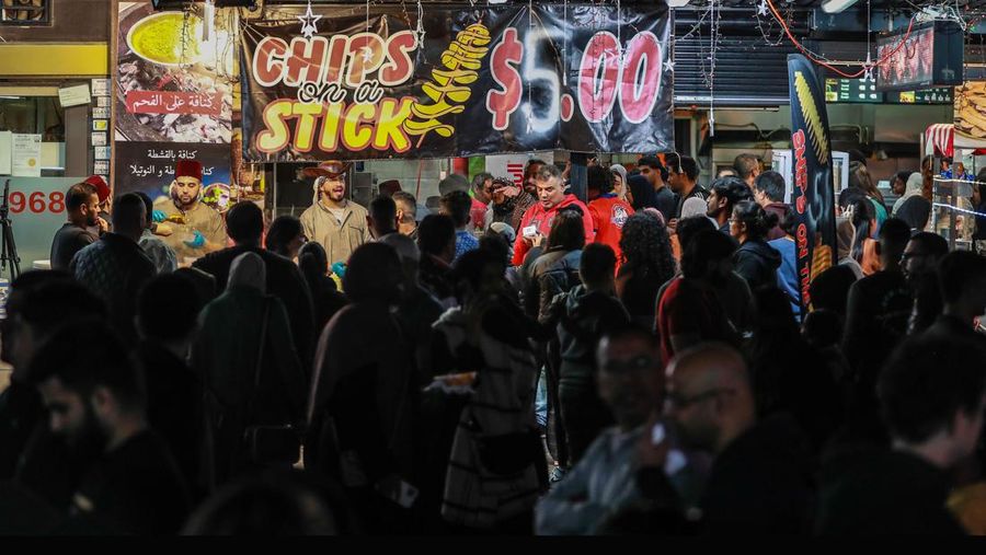 SYDNEY, AUSTRALIA - APRIL 01: People attend the Ramadan Nights food and cultural festival at Lakemba on April 01, 2023 in Sydney, Australia. The holy fasting month of Ramadan is observed by Muslims around the world, including many in Australia, who adhere to its principles in their own suburban communities. (Photo by Roni Bintang/Getty Images)