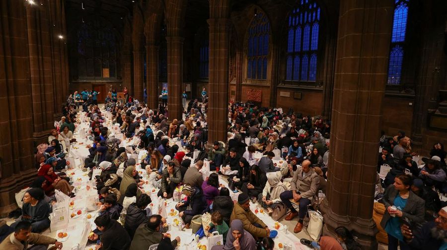 People queue outside Manchester Cathedral for the Iftar (breaking fast) event during the Muslim holy fasting month of Ramadan, in Manchester, Britain, March 29, 2023. REUTERS/Molly Darlington