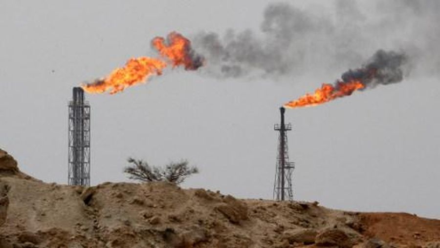 A picture taken on March 12, 2017, shows a view of an oil facility in the Khark Island, on the shore of the Gulf. (Photo by ATTA KENARE / AFP)
