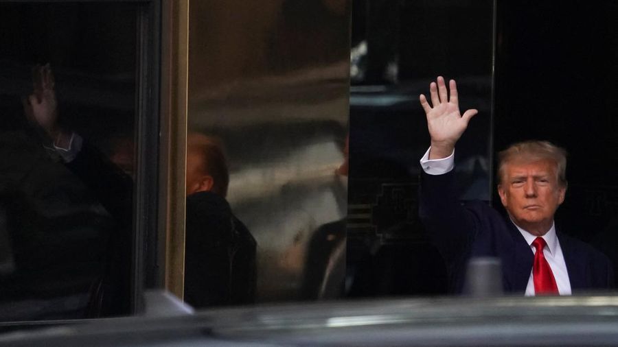 Former U.S. President Donald Trump's motorcade waits at the Manhattan Criminal Courthouse on the day of Trump's court appearance after his indictment by a Manhattan grand jury following a probe into hush money paid to porn star Stormy Daniels, in New York City, U.S., April 4, 2023. REUTERS/Bing Guan