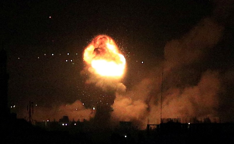 ISRAEL-SECURITY/ROCKETS-GAZA Streaks of light are seen as Israel's Iron Dome anti-missile system intercept rockets launched from the Gaza Strip, as seen from Ashkelon, April 7, 2023. REUTERS/ Amir Cohen