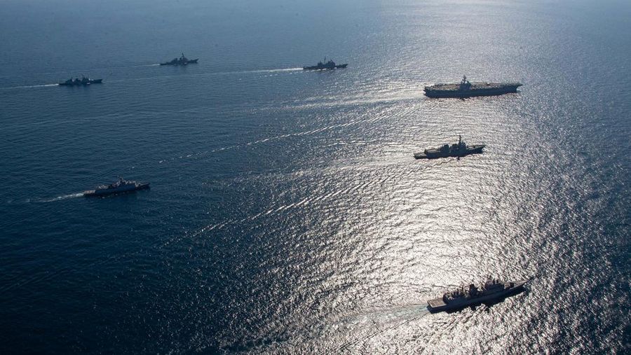 EAST SEA, SOUTH KOREA - SEPTEMBER 29: In this handout image provided by the South Korean Defense Ministry, The U.S. nuclear-powered aircraft carrier Ronald Reagan (R) during a US-South Korea combined naval exercise on September 29, 2022 in East Sea, South Korea. The four-day drills came as Seoul and Washington are cranking up security cooperation amid continued speculation that North Korea could engage in provocative acts, like a nuclear test or submarine-launched ballistic missile launch. (Photo by South Korean Defense Ministry via Getty Images)