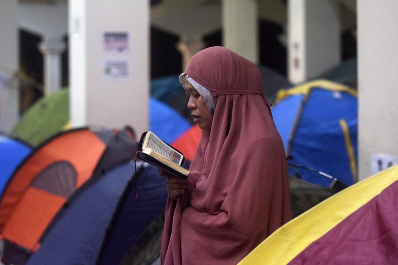 RELIGION-RAMADAN/SAUDI General view of muslims performing evening prayers at the Grand Mosque during the holy month of Ramadan, in the holy city of Mecca, Saudi Arabia, April 11, 2023. Saudi Press Agency/Handout via REUTERS ATTENTION EDITORS - THIS PICTURE WAS PROVIDED BY A THIRD PARTY